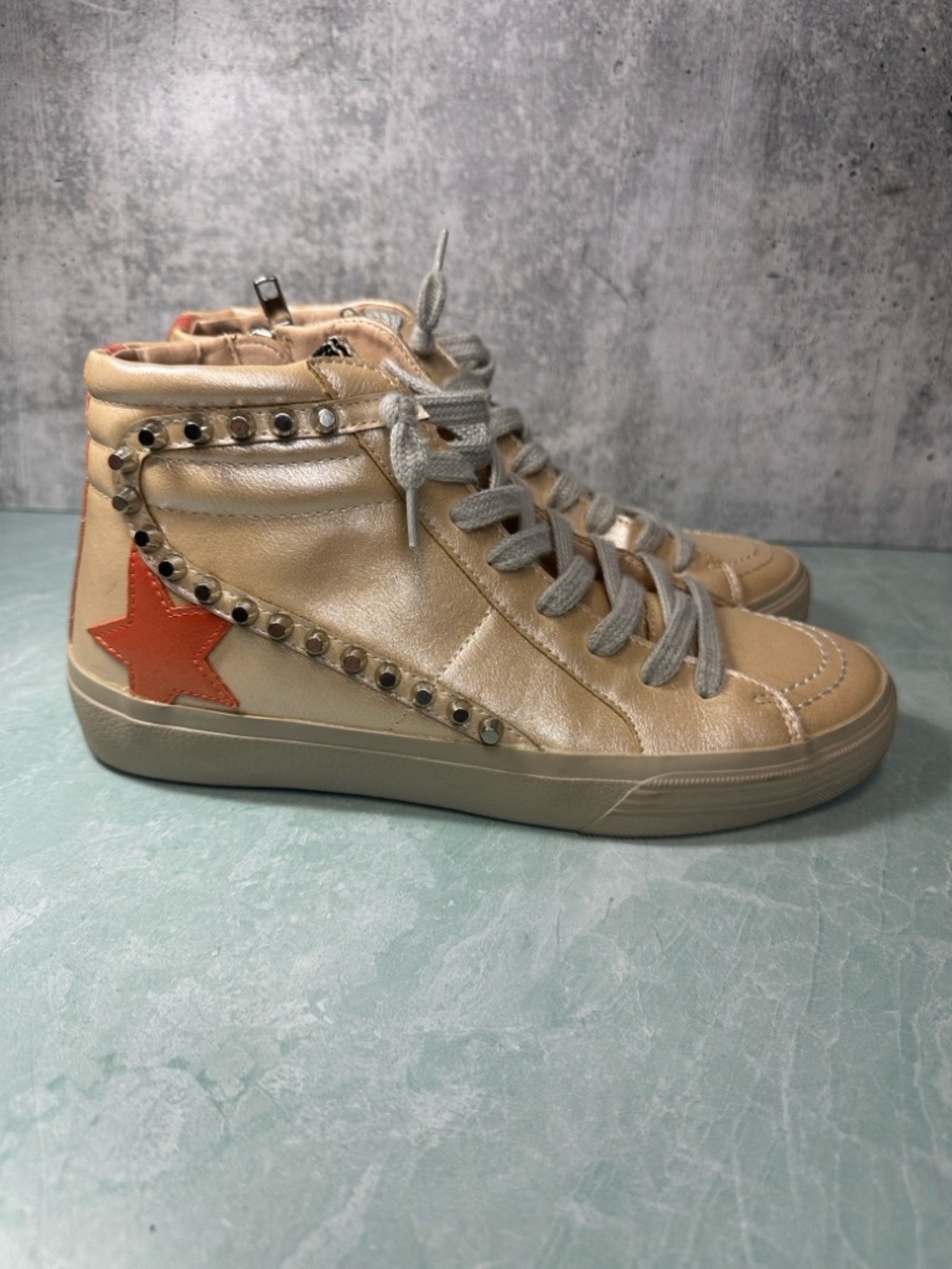 ShuShop Riri Champagne Metallic High-Top Sneakers Orange Star Accent